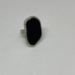 EXTENDABLE BLACK STATEMENT RING